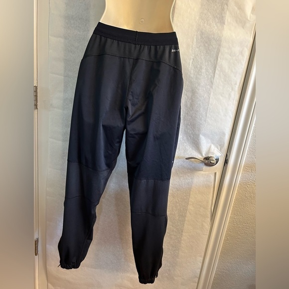 Nike women’s DriFit shield running jogger pants w/zip pockets & ankles Sz-XS X4 - Picture 7 of 12